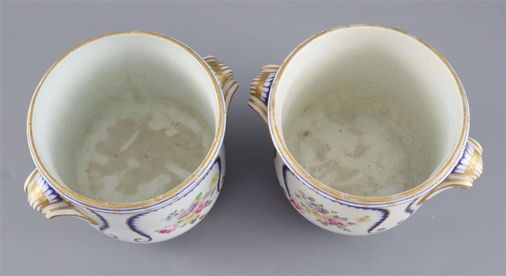 A pair of Sevres half bottle wine coolers, 12cm high